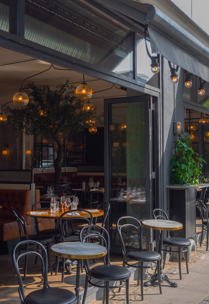 Bistro tables out on the front of 1470 Argyle Street