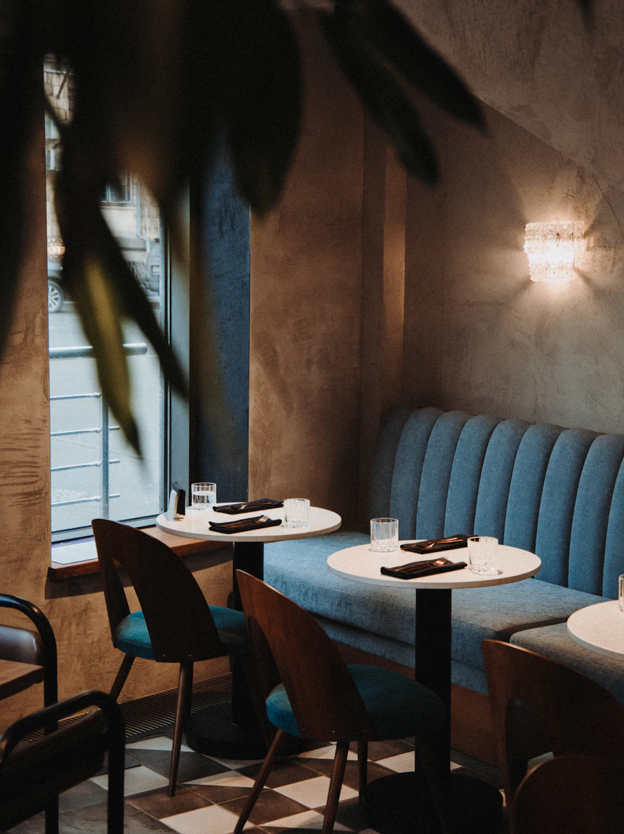 Morning light across the tables by the front window