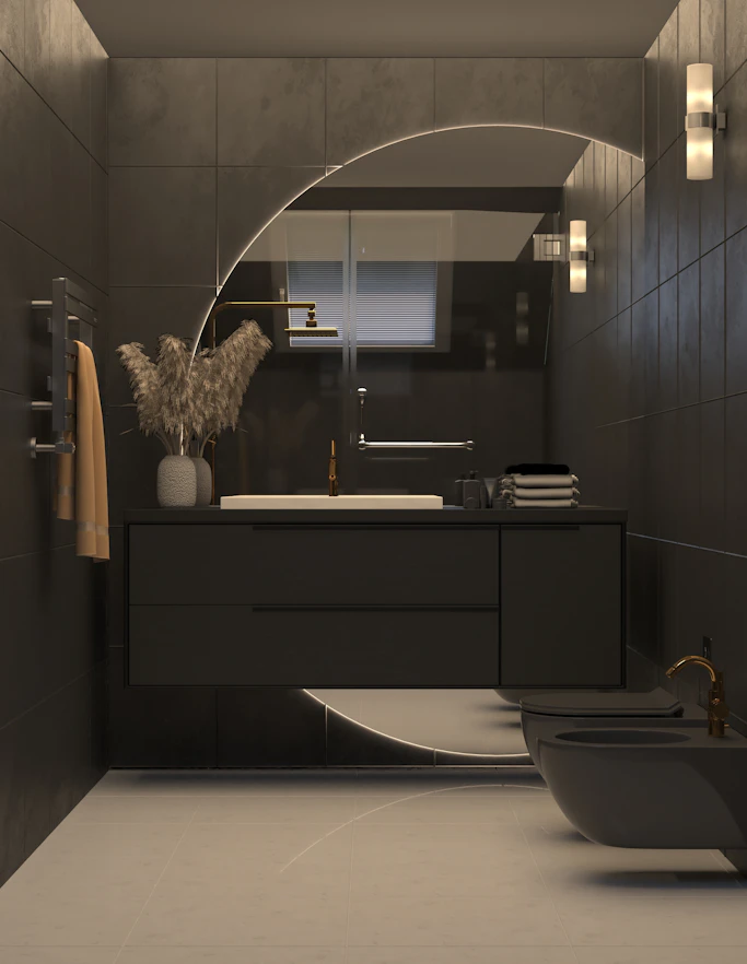 A bathroom with a black vanity and an arched black-framed mirror.