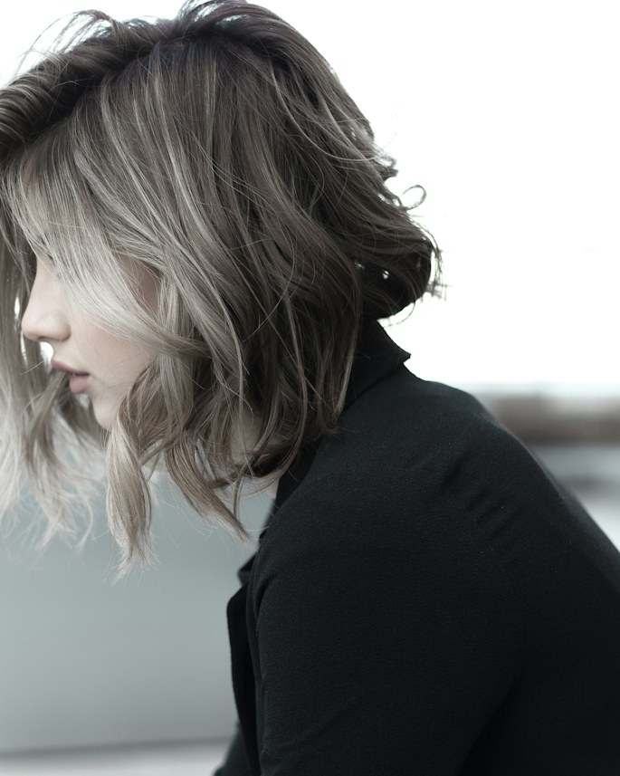 Textured blonde bob with a beach wave finish