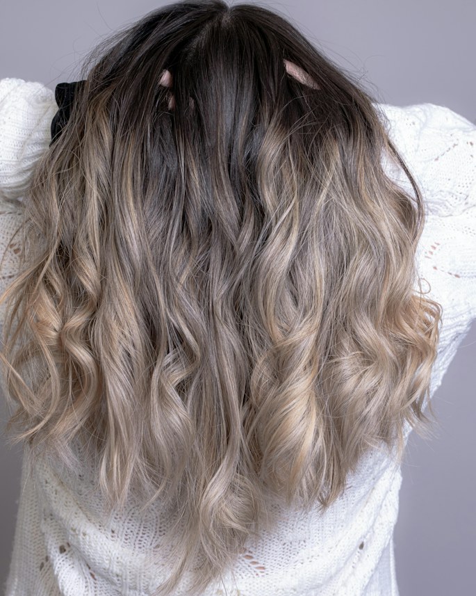 Ash and silver blonde highlights on long straight hair