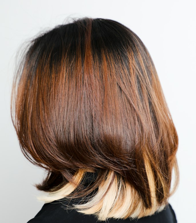 Two-tone colour, near-black on top and copper through the ends