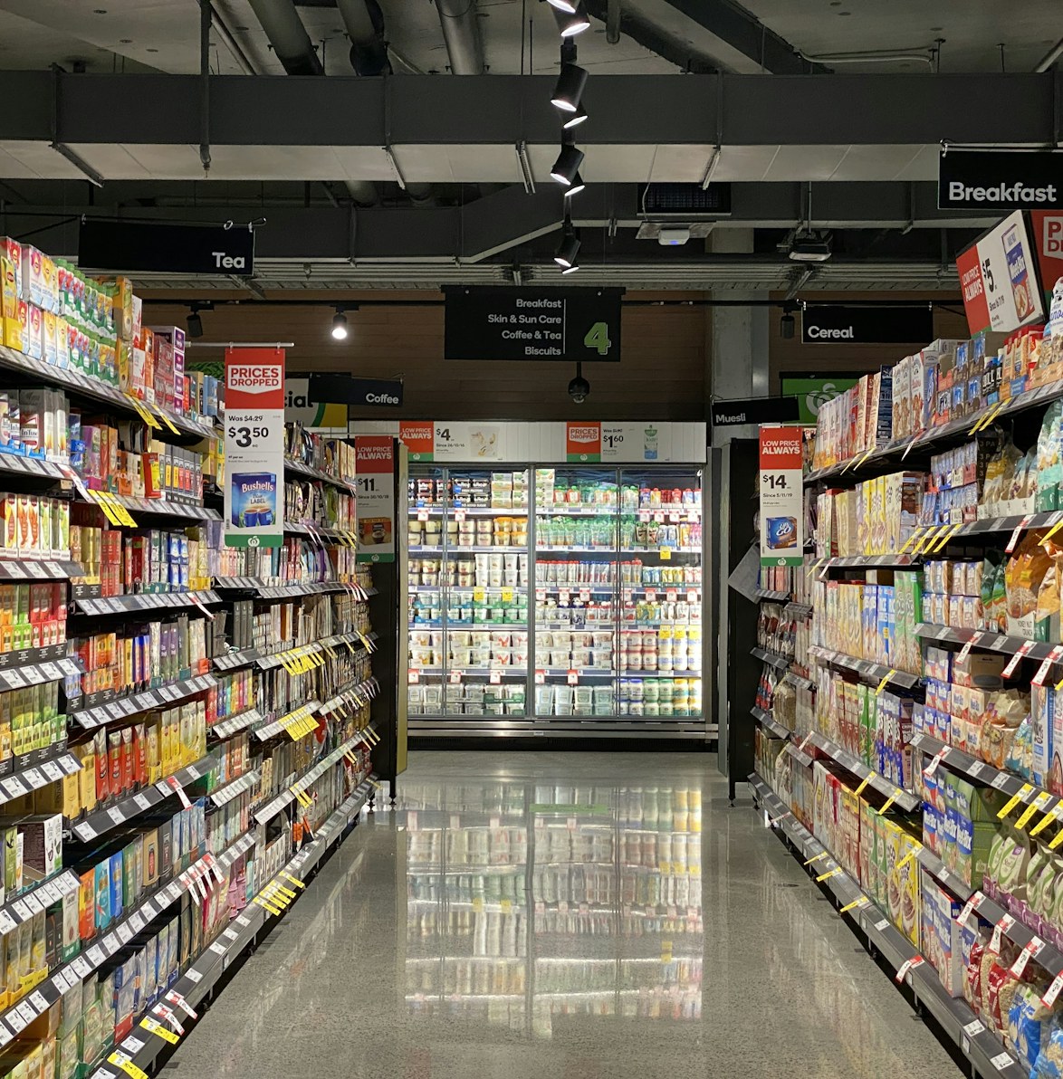 Aisle shelves stacked with imported Dutch groceries, front to back
