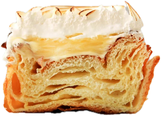 A slice of laminated pastry with custard and torched meringue