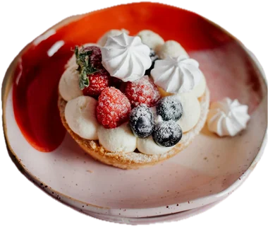 Raspberry tart with meringue on a plate